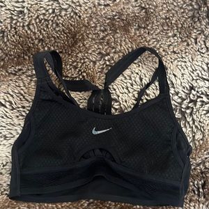 Black strappy sports bra. No padding.